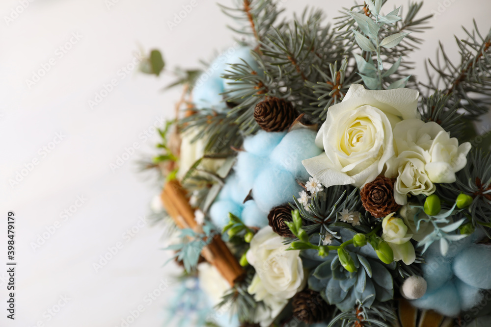 Beautiful wedding winter bouquet on light background, closeup. Space for text