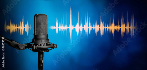 Microphone with yellow waveform on modern blue background, broadcasting or podcasting banner	
