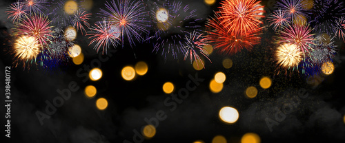 Fireworks to celebrate happy new year. Happy New Year 2021. Christmas and New Year holidays background, winter season.