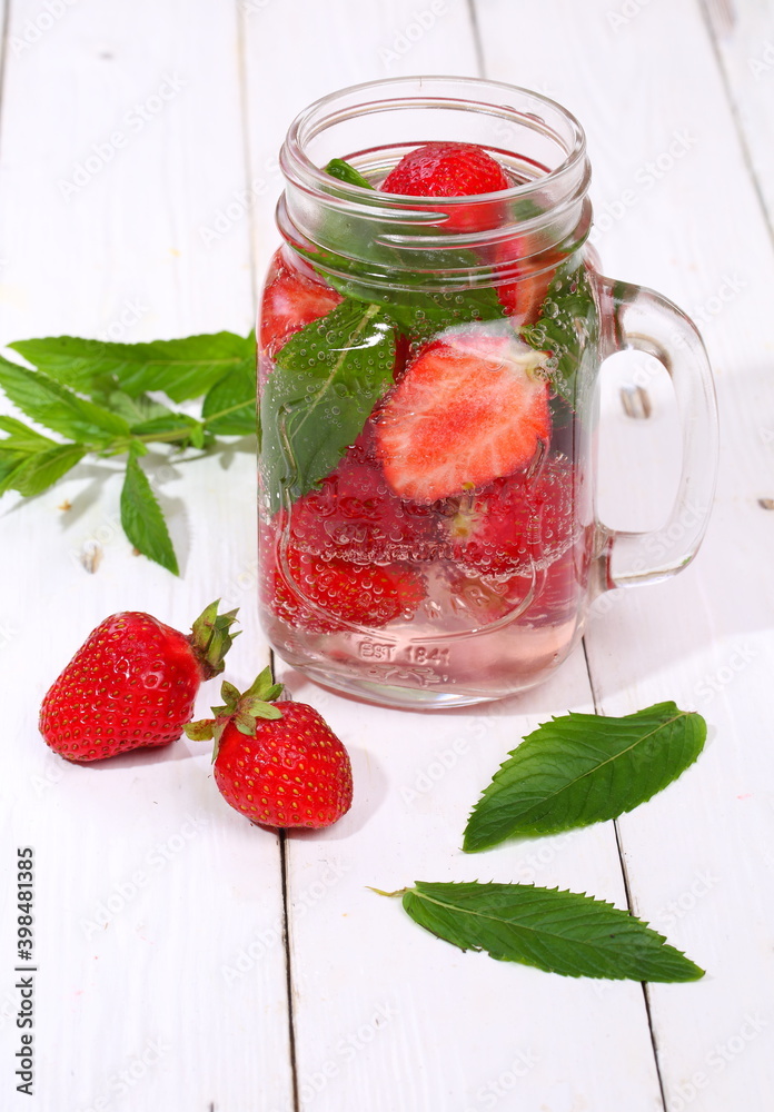 Fruit smoothies on a white wooden table