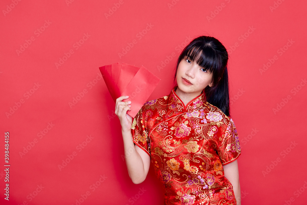 woman wearing red cheongsam Holding Envelope woman wearing red cheongsam Holding Envelope