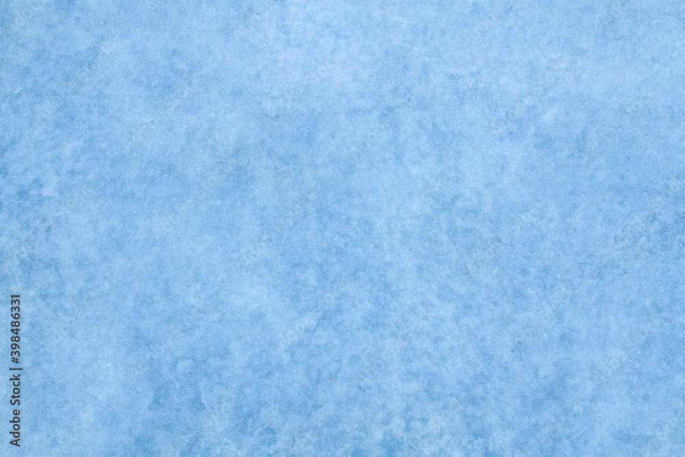 Ice blue background. Frozen water, sea.