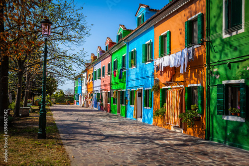 Colourful houses in the village of Burano, small island in the bay of Venice, Italy © hardyuno