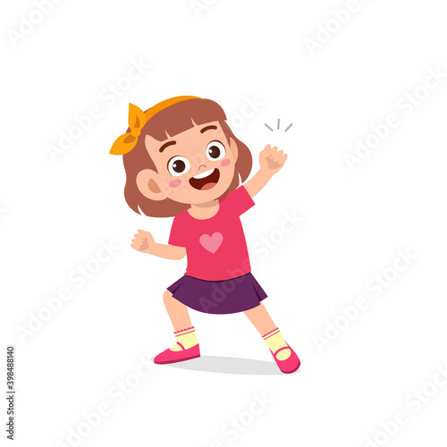 cute little kid girl show win fist up expression gesture