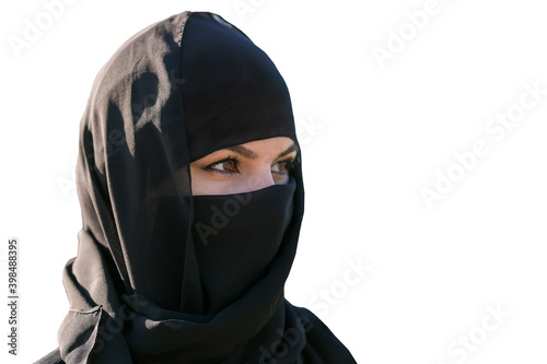Portrait of a beautiful Muslim woman in hijab. Isolated on white.