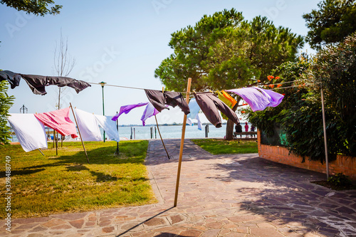 Washing day in the colourful village of Burano, small island in the bay of Venice, Italy