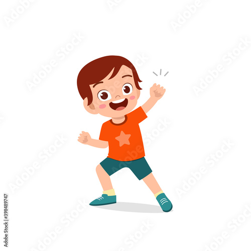 cute little kid boy show win fist up expression gesture