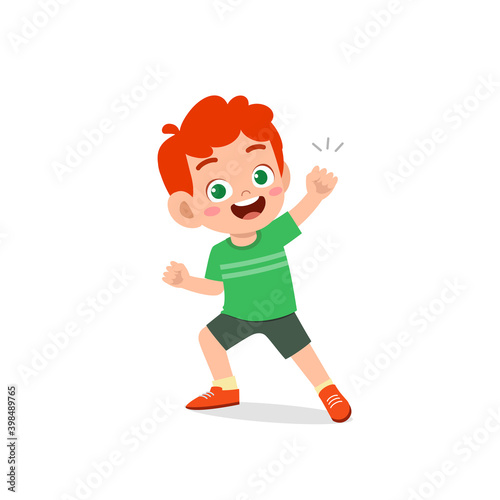 cute little kid boy show win fist up expression gesture