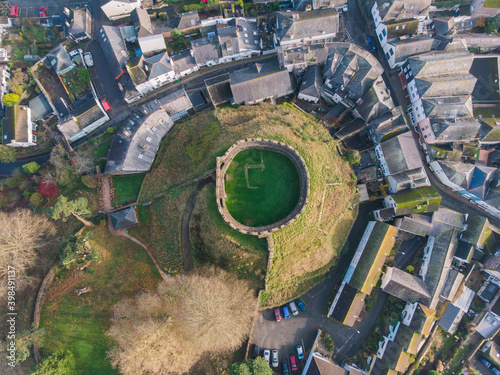 Aerial drone shot of 14th century castle ruins in Totnes, England photo
