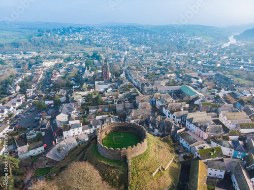 Aerial drone shot of 14th century castle ruins in Totnes, England photo