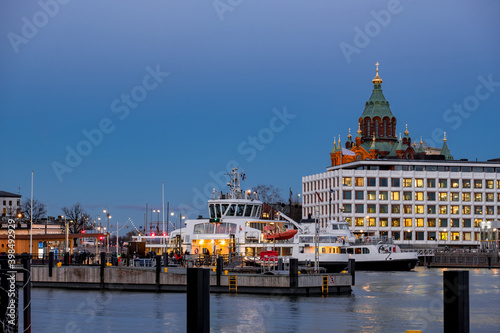 Obraz na płótnie The ferry ship is arriving to Helsinki port in the evening, Finland. w salonie