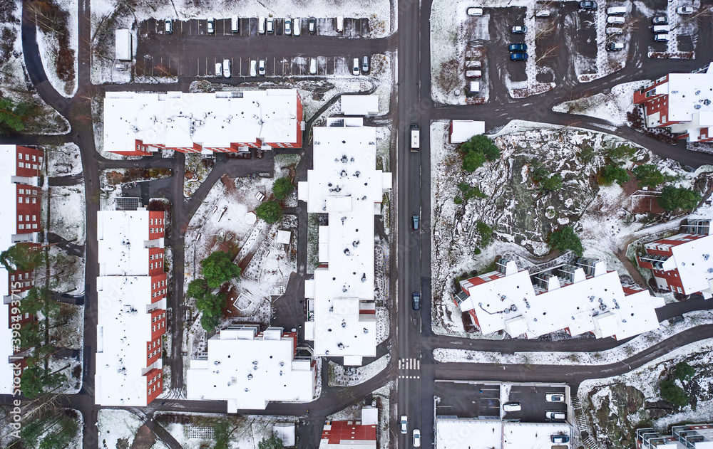 Aerial view of the apartment buildings in Matinkyla neighborhood of Espoo, Finland. First snow in the city.