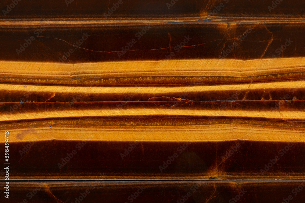Tiger eye stone texture background, symmetry Tiger eye stone texture background, symmetry