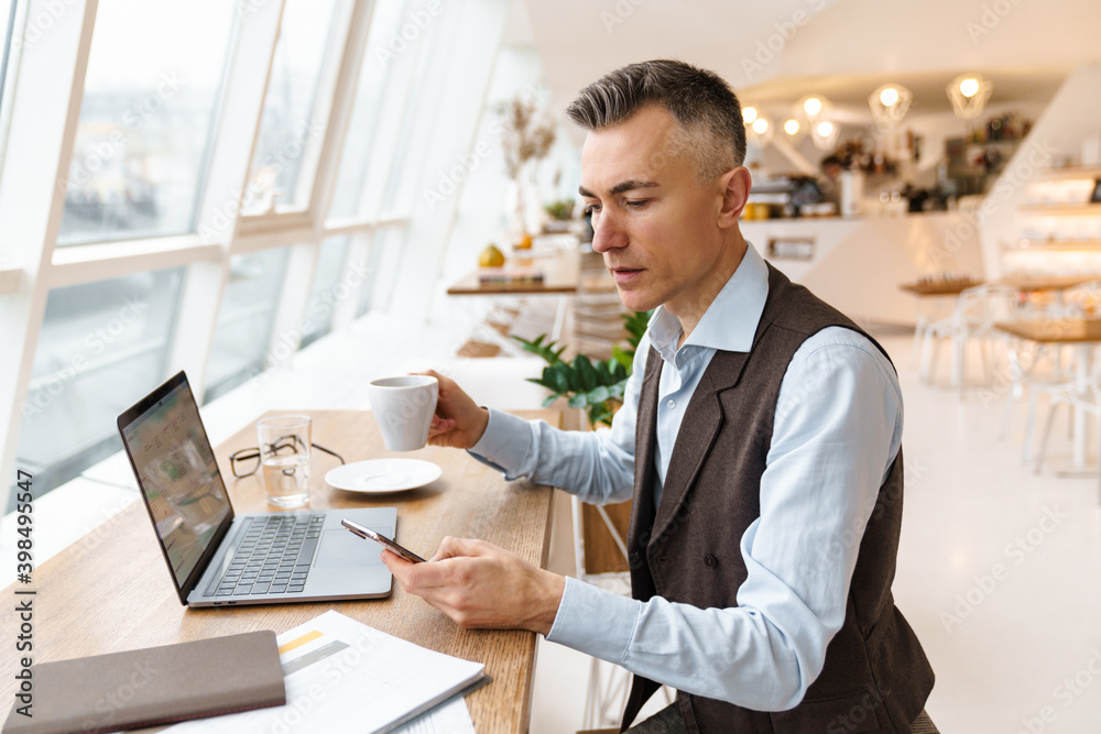 Confident handsome businessman in smart clothes Confident handsome businessman in smart clothes