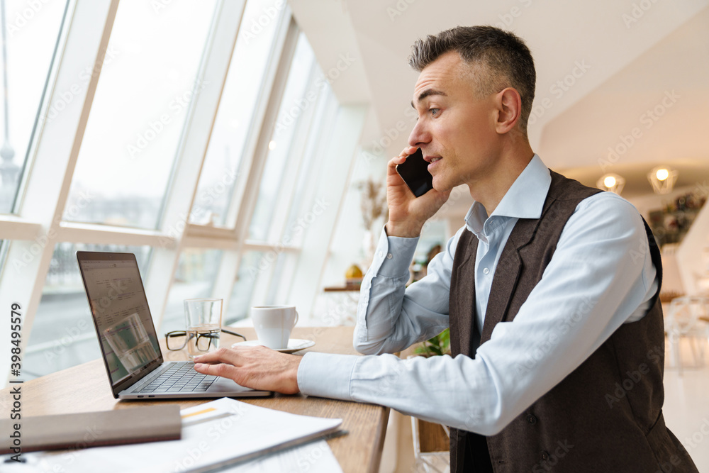 Confident handsome businessman in smart clothes Confident handsome businessman in smart clothes