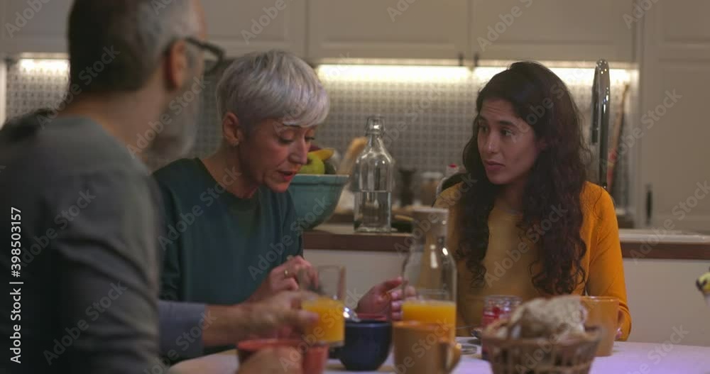 Senior couple having breakfast with daughter Senior couple having breakfast with daughter