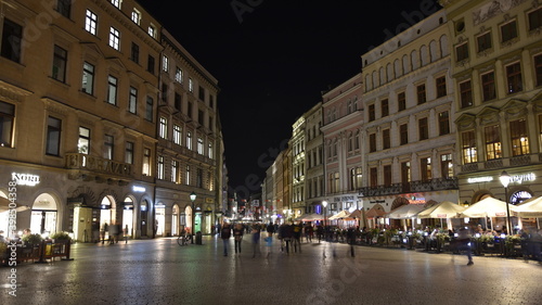 Kraków miasto w Polsce wpisane na listęUnesco. Nocny spacer po ulicach polskiej stolicy turystyki. photo