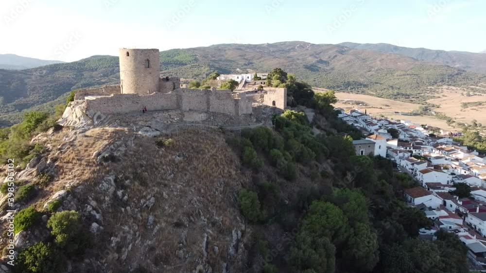 castle on the mountain with the village on the hillside castle on the mountain with the village on the hillside