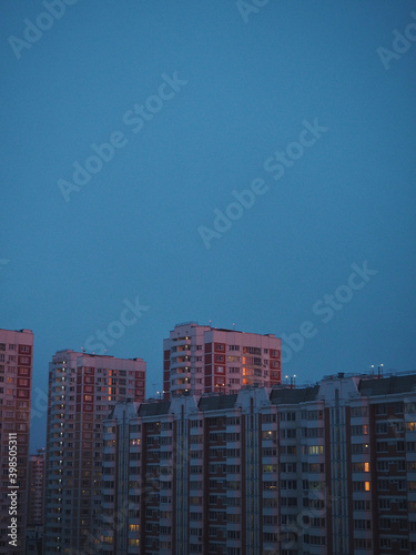 red buildings in blue sky 