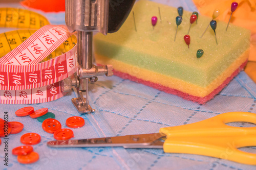 Thread, needles and cloth. tools for sewing for hobby