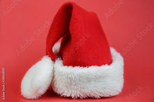 Santa Claus hat against red background