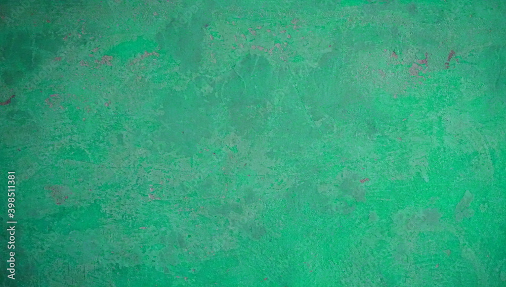 Verwitterte alte Steinwand als Hintergrund in grün