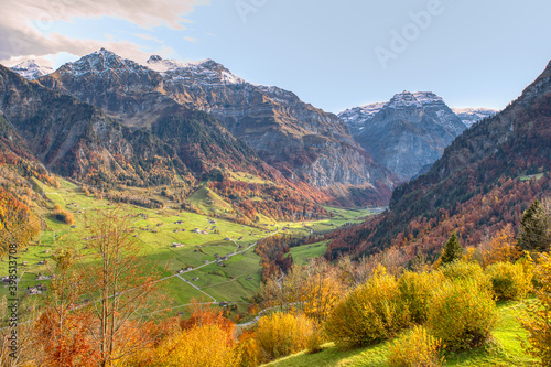 Charming autumn landscape in Swiss Alps. Colorful autumn scene of Swiss Alps. Location  Linthal  Canton Glarus  Switzerland  Europe