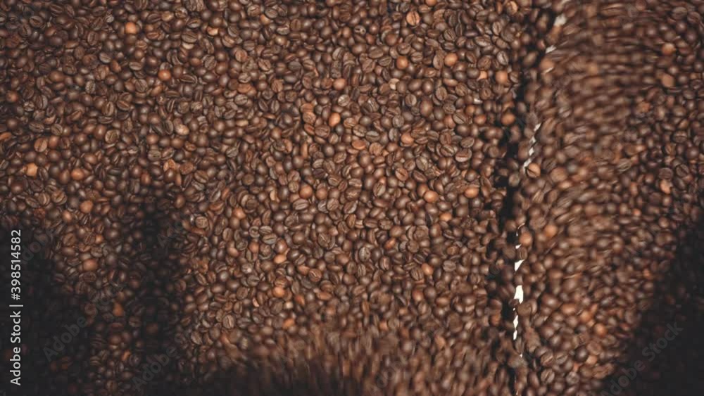 top view of roasted coffee beans in machine