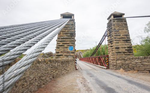 Historic bridge structure at Ophir crossing Manuherikia River in Central Otago photo