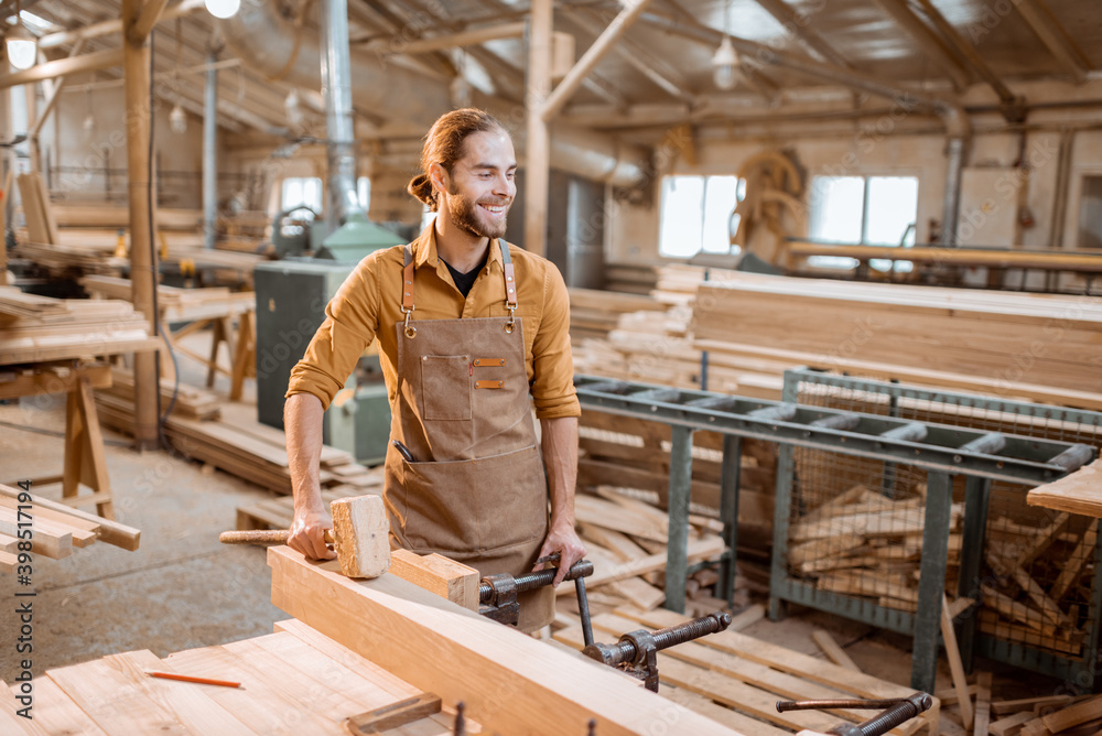 Portrait of a handsome carpenter at the joiner's shop Portrait of a handsome carpenter at the joiner's shop