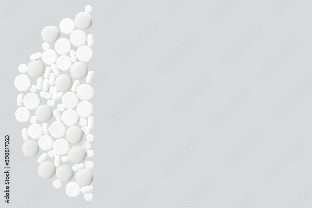 Various white medical pills on white background Various white medical pills on white background