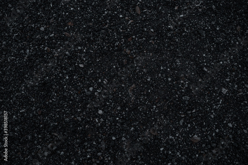 Stone chips on asphalt for dark background