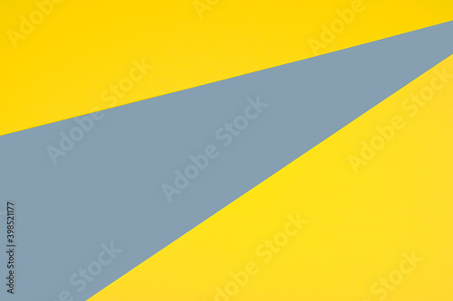 Abstract paper texture surface. Presentation of Trending Colors of the Year 2021- yellow and gray.