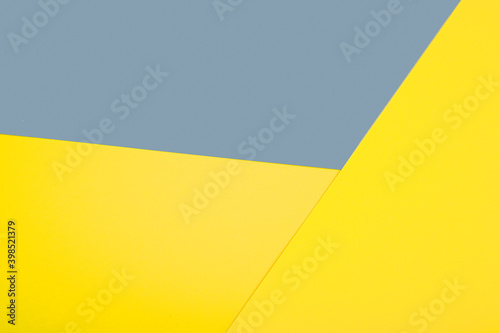 Abstract paper texture surface. Presentation of Trending Colors of the Year 2021- yellow and gray.