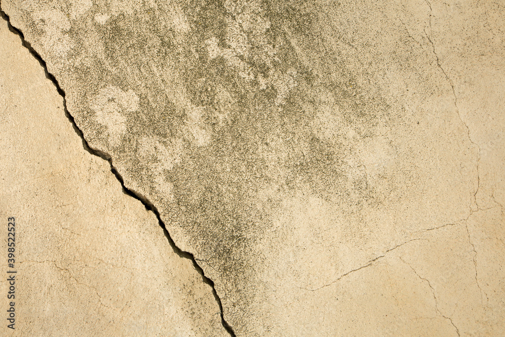 Obraz premium Texture of the old wall with peeling paint, plaster with cracks. Texture backround.
