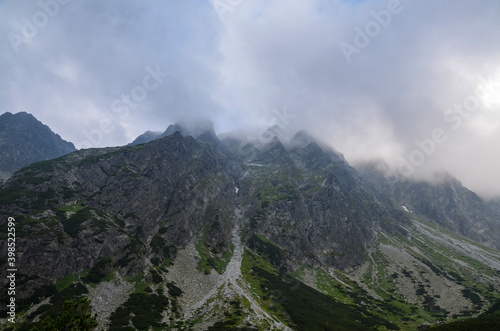 Beautiful summer landscape with rocky mountain peaks at High Tatras mountains, Slovakia. Hiking adventure.