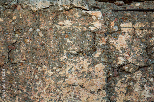 Texture of a wall from an old stone close-up. Background