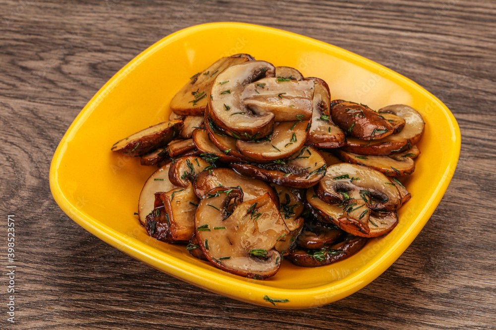 Roasted champignon with herbs and spices