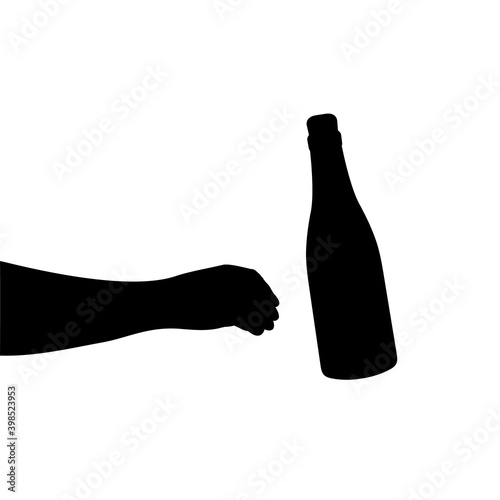 Silhouette hand reaches for bottle of alcohol