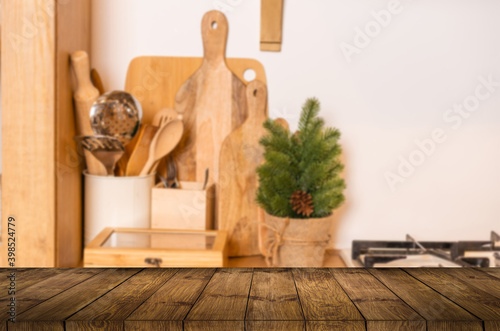 Wood table top on blur kitchen room background .For montage product display or design key visual layout