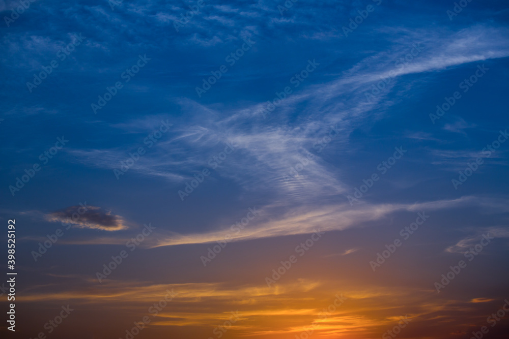 Blue orange sunset with clouds.