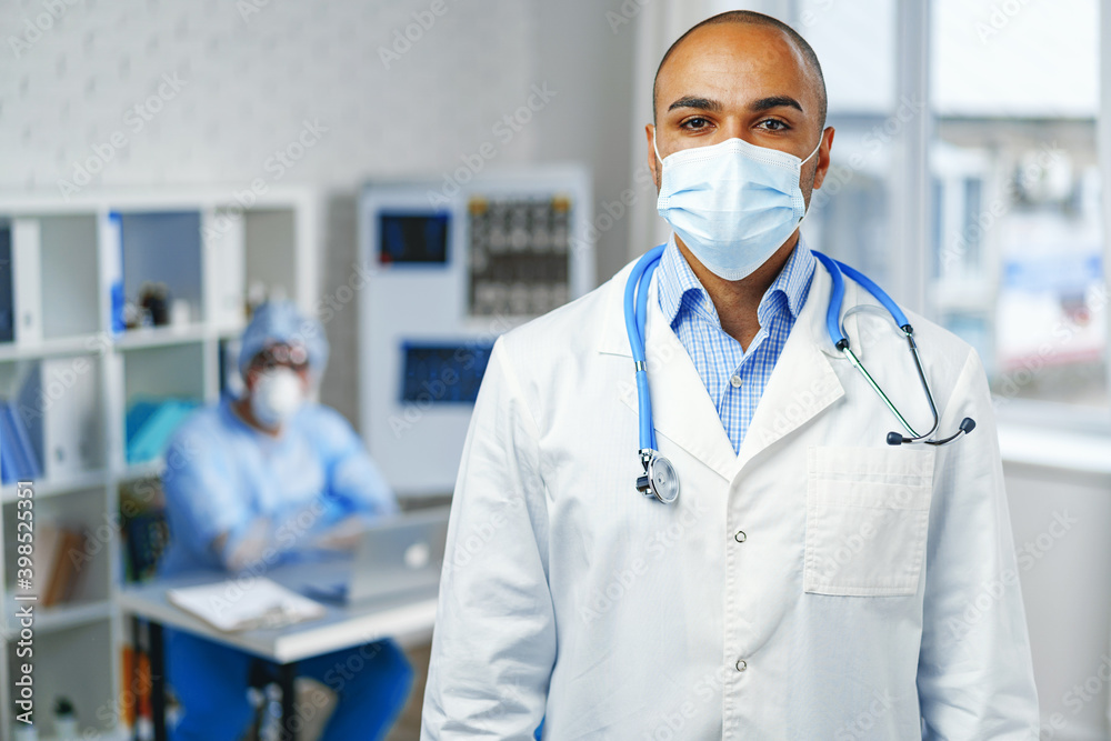 Portrait of african american doctor, hospital background Portrait of african american doctor, hospital background