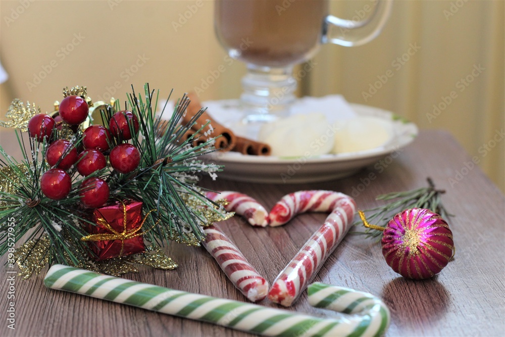 christmas still decoration with coffee and lollipops