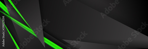 Triangular background. Abstract composition of 3D triangles. The geometric background of modern green is insulated black