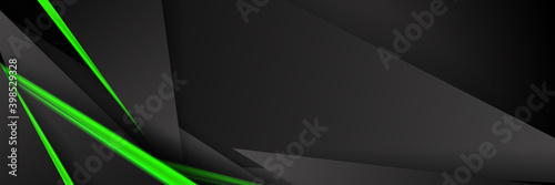 Triangular background. Abstract composition of 3D triangles. The geometric background of modern green is insulated black