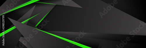 Modern abstract futuristic hexagon carbon fiber and glowing light green luminous lines in black dark room technology background