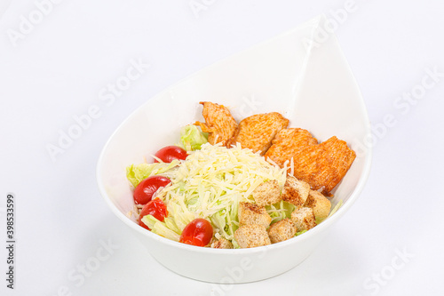 Caesar salad with chicken and parmesan