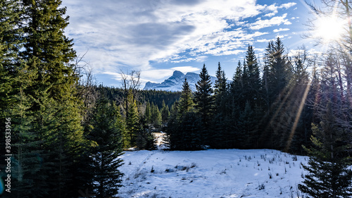 clouds mountain and trees snow