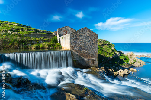 Molino El Bolao, El Molino Waterfall, Cóbreces, Alfoz de Loredo municipality, Cantabria, Spain, Europe © JUAN CARLOS MUNOZ