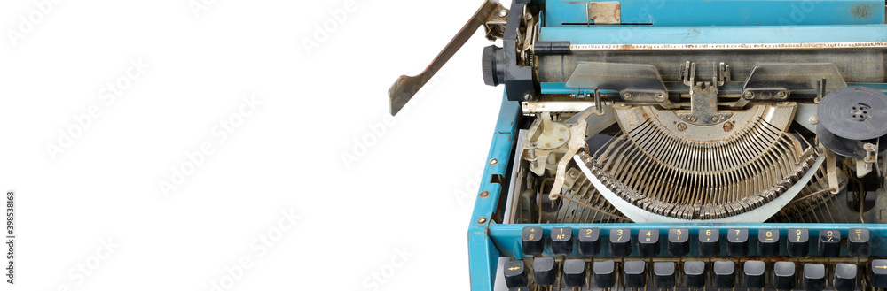 Old typewriter isolated on white . Free space for text. Wide photo.